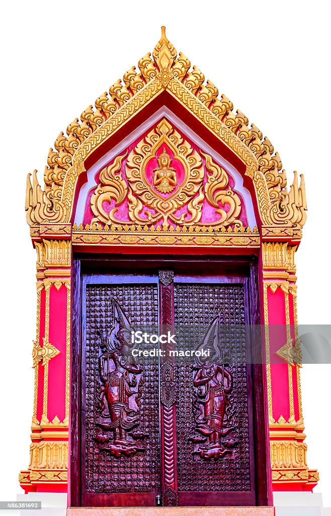 window temple in thailand Buddhist deity in window at temple thailand 2015 Stock Photo
