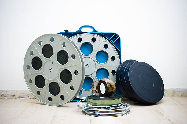istock Many 35 mm cinema movie reel with boxes 486382152