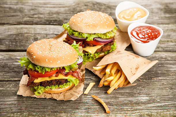 istock Delicious hamburger and fries 486386122