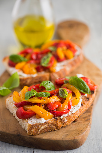 Bruschetta with Goat Cheese and Roasted Bell Peppers Salad