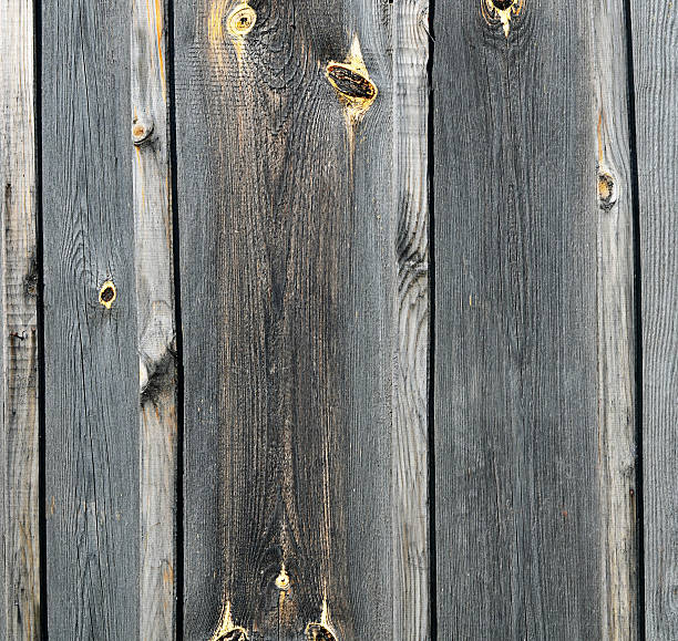 istock Fence from wooden boards close up 486388116
