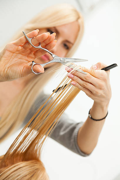 istock Woman's Haircut Close up 486389785