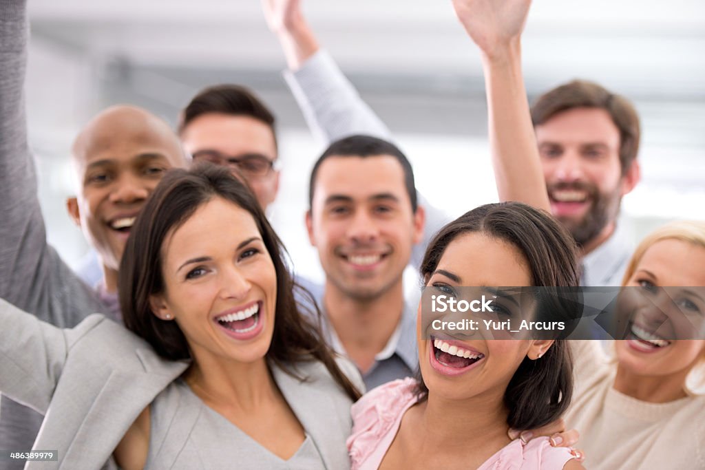 We've made it to the big time! Cropped shot of a group of smiling businesspeoplehttp://195.154.178.81/DATA/i_collage/pi/shoots/783159.jpg 20-29 Years Stock Photo