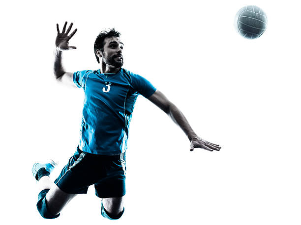 man volleyball jumping silhouette one caucasian man volleyball jumping in studio silhouette isolated on white background in studio silhouette isolated on white background male volleyball player stock pictures, royalty-free photos & images