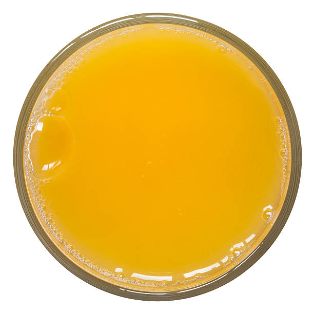 istock Glass of orange juice from above 486395407