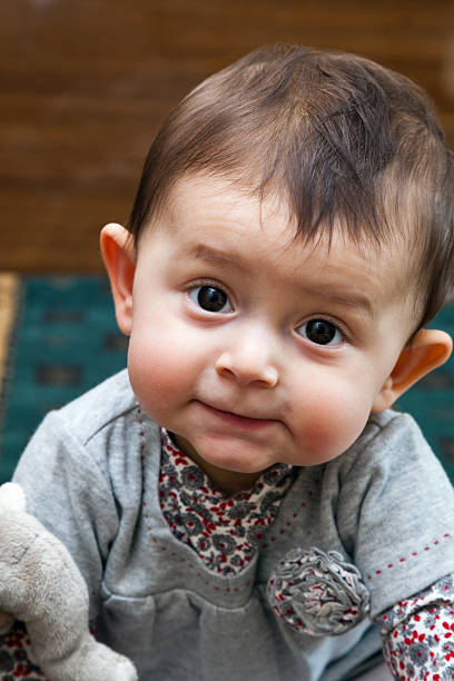 istock Smiling Baby Girl 486395627