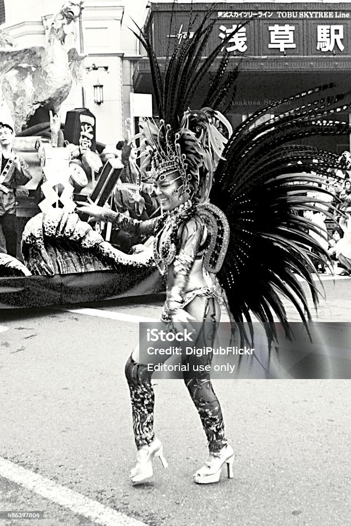 The 34th Asakusa Samba Carnival (2015) Tokyo, Japan - August 29, 2015: Beautiful female participant dancing on the street during the 34th Asakusa Samba Carnival, which is the annual samba carnival in Asakusa. 2015 Stock Photo