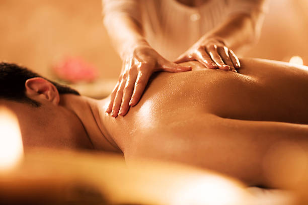 istock Unrecognizable man receiving massage at the spa. 486400856