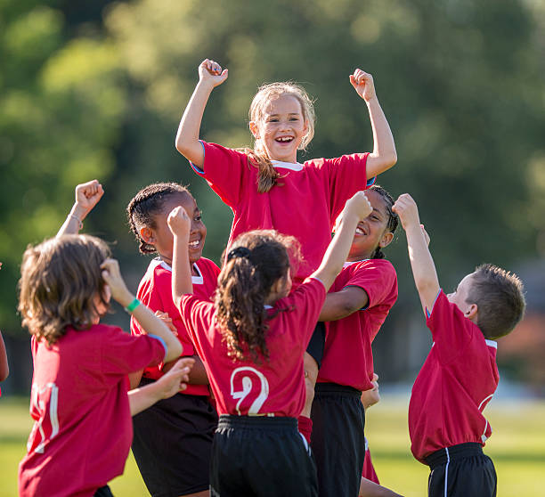 istock Little Girl in Soccer Huddle 486400958
