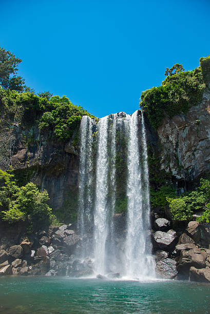 The Jeongbang Waterfall which falls directly into the sea, Jeju-do, South Korea