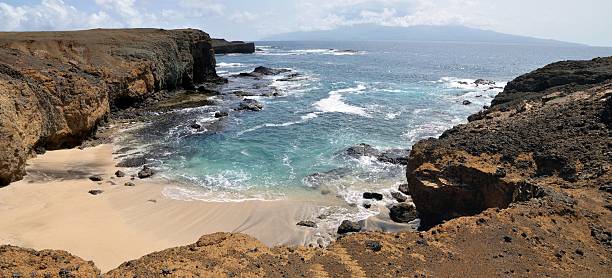 istock Waves. clear blue water, and white sand beach 486409178