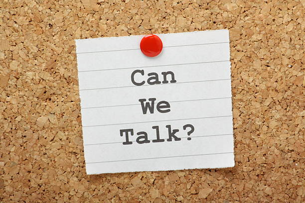 Can We Talk? The question, Can We talk on a paper reminder note pinned to a cork notice board mediation photos stock pictures, royalty-free photos & images