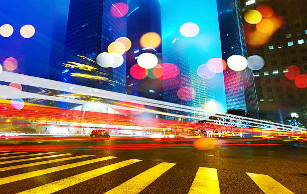 istock light trails on the modern building background in shanghai china 486415543