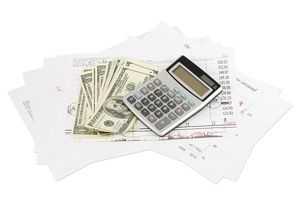 istock Dollars, calculator and paper charts 486415803