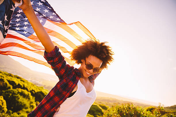 istock African american waving flag 486417137
