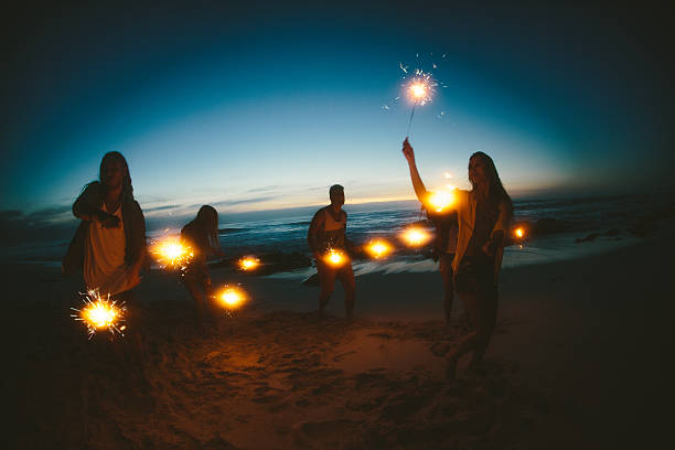 istock Group of friends with fireworks 486417201