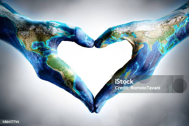 Earths Day Celebration Hands Shaped Heart With World Map Stock Photo - Download Image Now