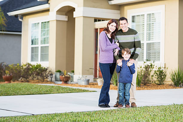 istock Young family outside home 486418883