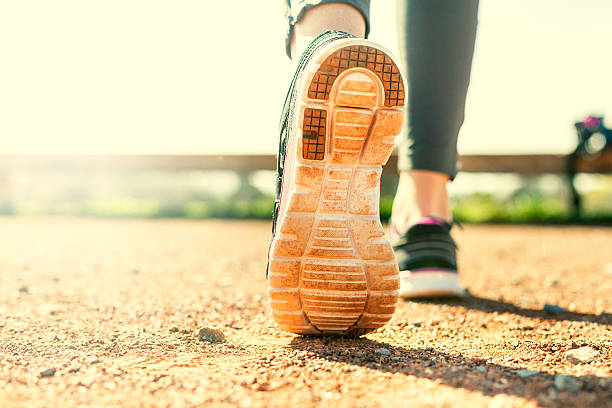 istock Sports Woman's legs in running movement 486418937