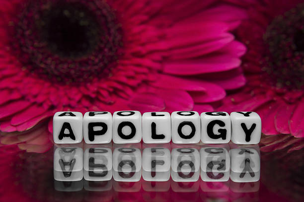 istock Apology with pink flowers 486419585