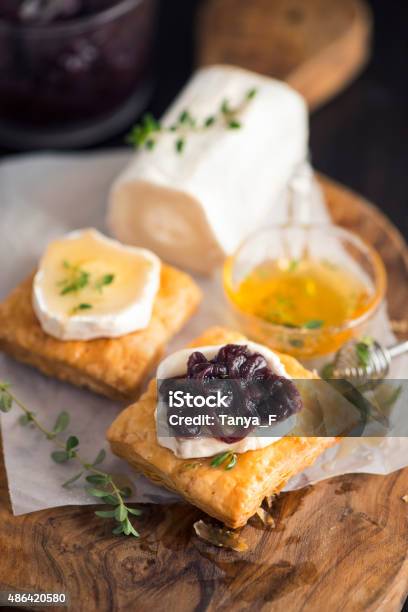 Goat Cheese Appetizer With Onion Marmalade And Honey Stock Photo - Download Image Now