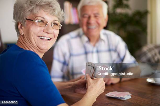 We Are Never Too Old To Play Cards Stock Photo - Download Image Now - Playing Card, Senior Adult, Senior Couple