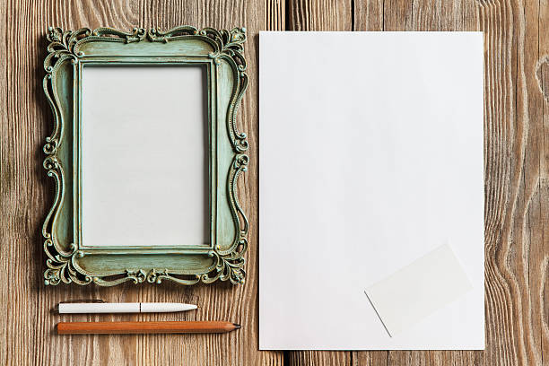 istock Mockup on wooden background with vintage old picture frame 486421130