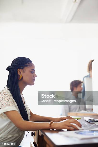 Totally Focused On The Job At Hand Stock Photo - Download Image Now - 20-24 Years, 20-29 Years, Adult