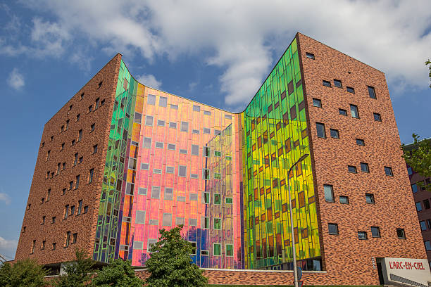 Modern office building in Deventer Deventer, The Netherlands - August 7, 2015: Modern office building reflecting all the colors of the Rainbow in Deventer deventer photos stock pictures, royalty-free photos & images