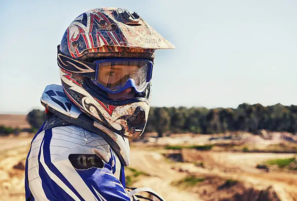 Portrait of motocross rider looking backhttp://195.154.178.81/DATA/i_collage/pi/shoots/783228.jpg