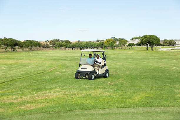 istock African golfers transporting to their next location. 486422121