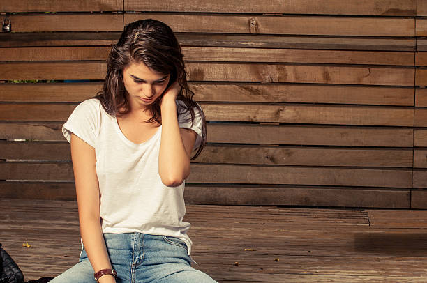istock Young and cute female model sitting 486424076
