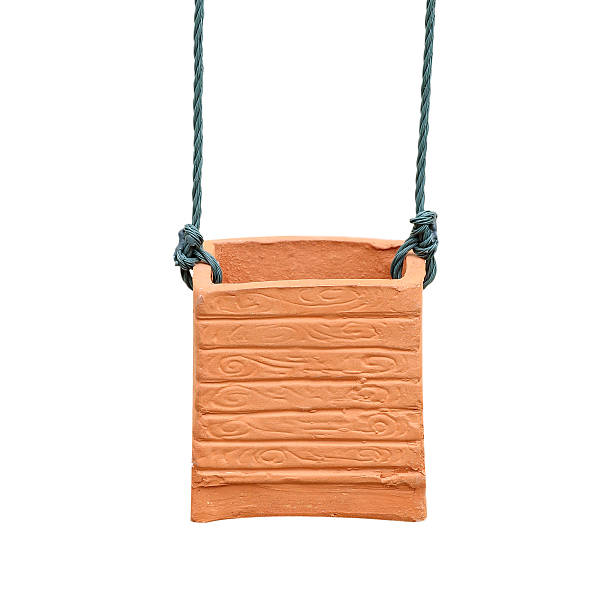 istock Hanging jardiniere from earthenware on isolated background. 486424828