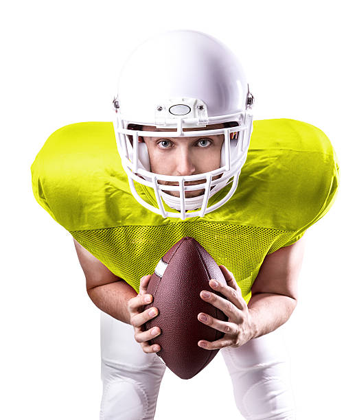 istock Football Player on yellow uniform isolated on white background 486425626