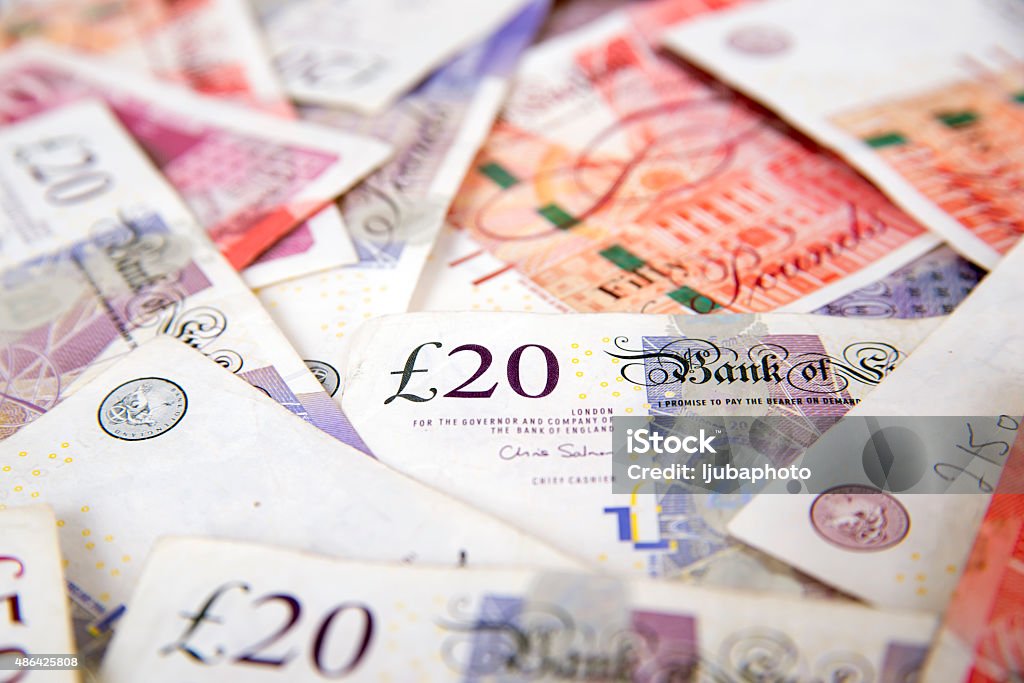 Sterling currency, British Pound Sterling A stack of bundled British Pound Sterling banknotes, British Currency, Pound Symbol, Currency, UK, Paper Currency, Currency, Finance, British Currency Stock Photo