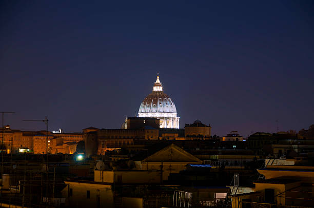 Saint Peter's basilica silhouette at sunset, Rome. Italy