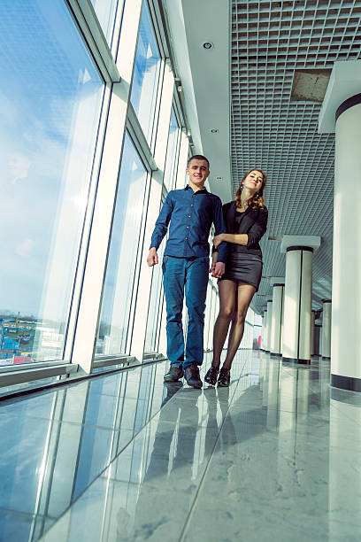 istock Young couple near the window 486430438