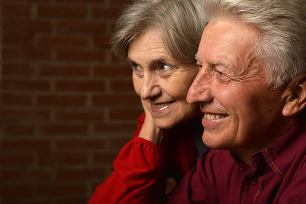 istock Elderly couple in red 486436590