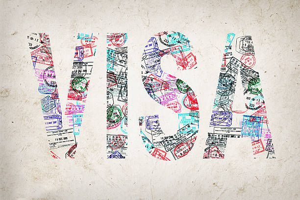 istock Word visa created with passport stamps on textured background 486441970