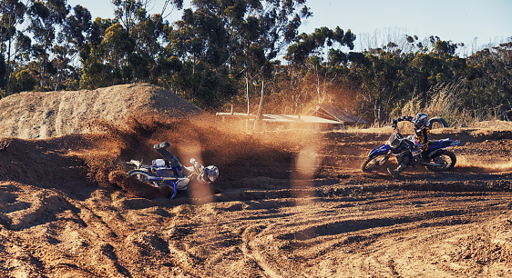 Shot of a motocross rider baling as his competitor comes up behind himhttp://195.154.178.81/DATA/i_collage/pi/shoots/783228.jpg