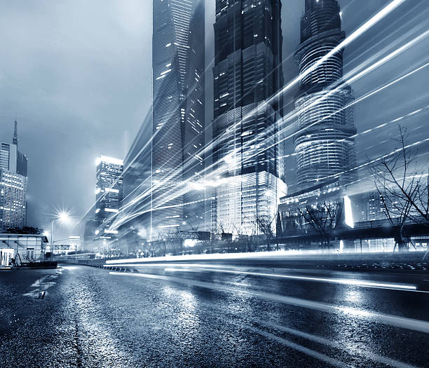 istock light trails on the modern building background in shanghai china 486442551