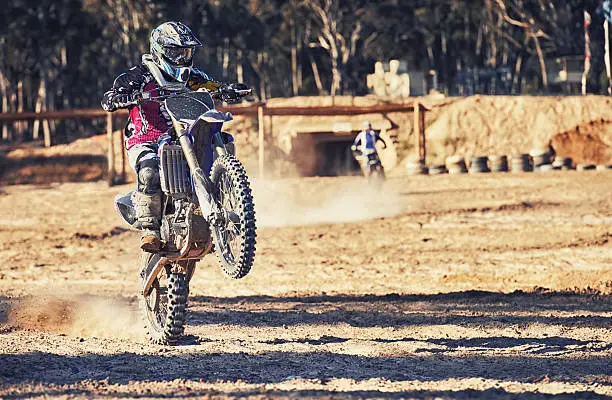 Shot of motocross rider showing off a little before the racehttp://195.154.178.81/DATA/i_collage/pi/shoots/783228.jpg