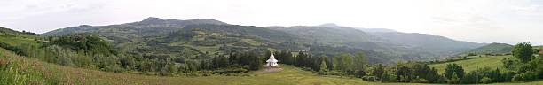 istock Buddhist stupa in Italian landscape panorama 486446317