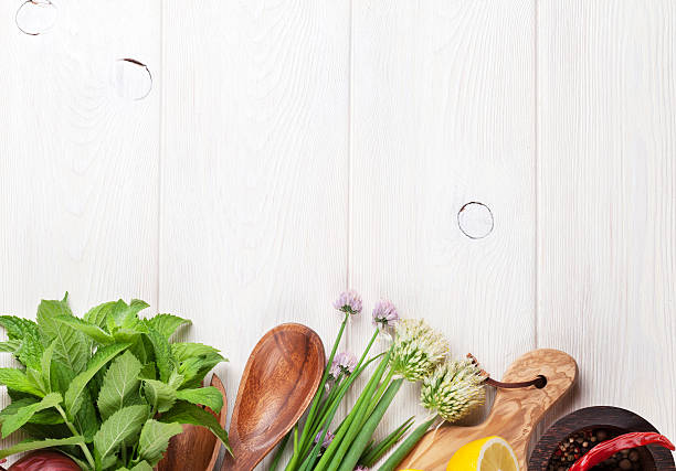 istock Fresh herbs and spices on wooden table 486451462