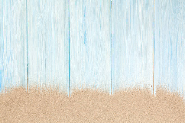 istock Sea sand on wooden floor 486451596
