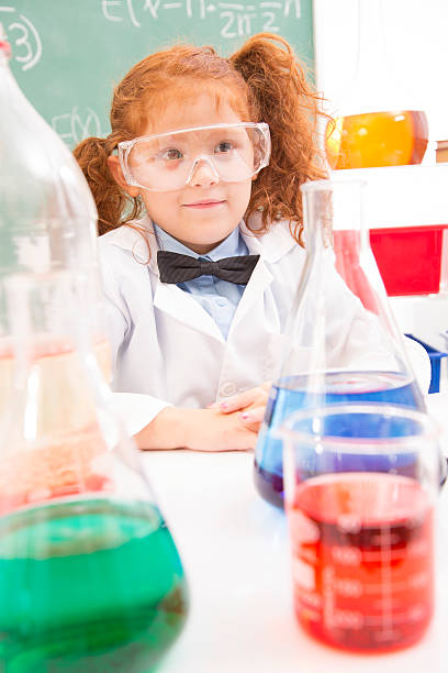 istock Education: School children in science class. Chemistry. 486456068