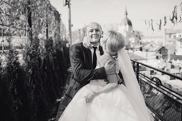 istock blonde bride with her groom 486456988