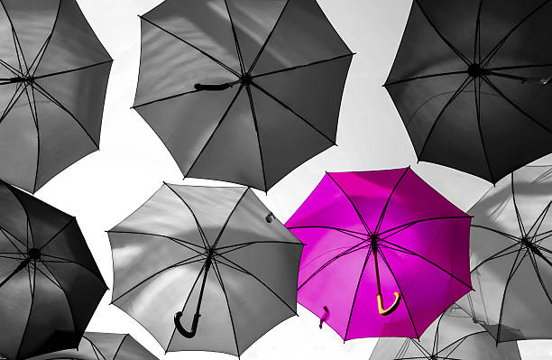 istock umbrella standing out from the crowd unique concept 486459662