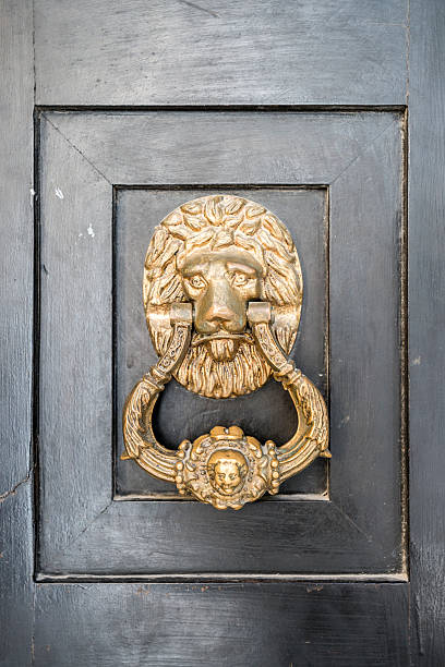 istock Golden lion door knocker 486460556