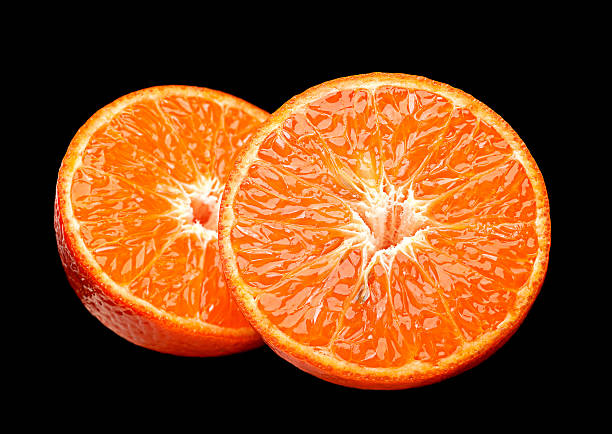 istock Tangerine citrus on black 486463110
